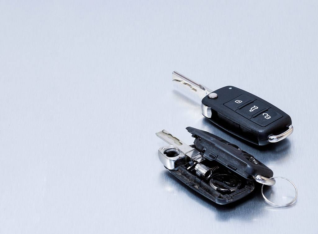 What factors influence the cost of car key duplication?